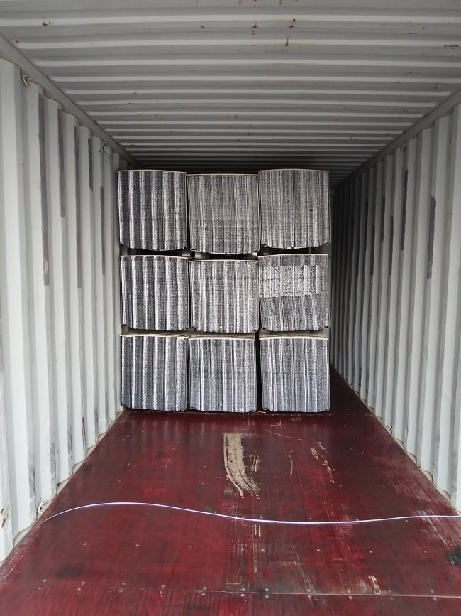 Close-up view of galvanized steel high-ribbed concrete reinforcement mesh