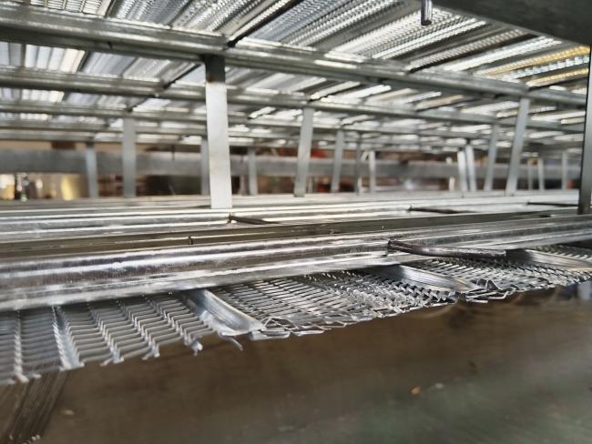Detailed view of the mesh pattern and galvanized finish
