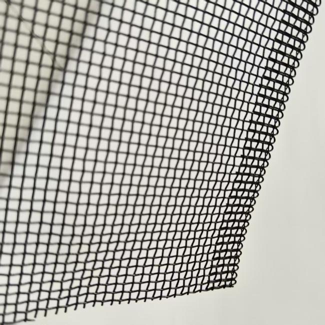 Aluminum mesh sample with measuring tape