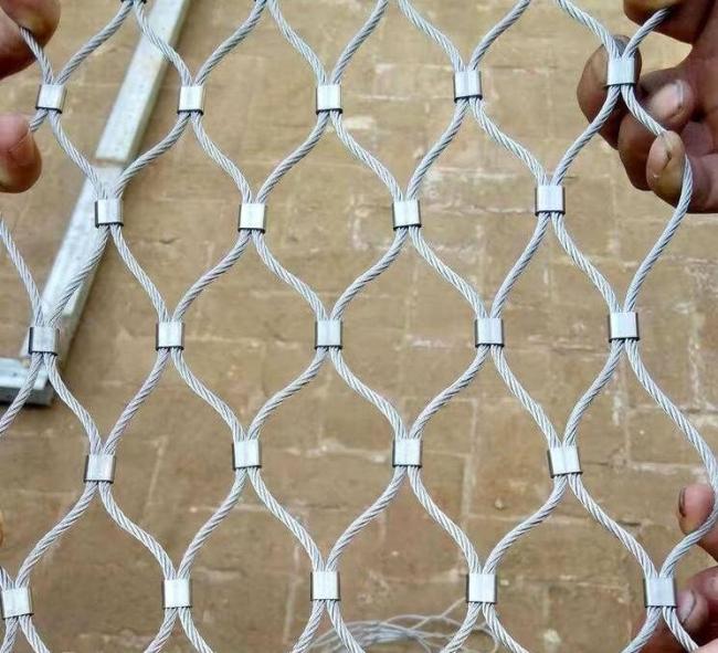 Stainless steel rope mesh installation in zoo enclosure