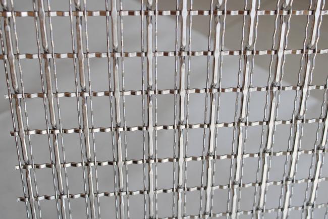 Decorative woven wire mesh curtain installation