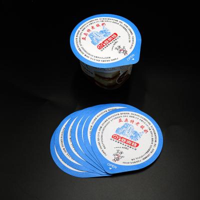 China Tampas de selagem da folha de alumínio da laca de Nespresso picosegundo 99mm cortados com aba da tração à venda
