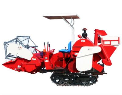 China ISO Mini Rice Harvesting Machine de descarga manual de alimentación lleno en venta