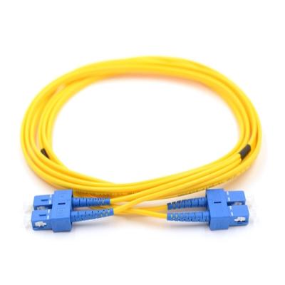 Китай SC UPC гибкого провода оптического волокна одиночного режима 9/125 двухшпиндельный к SC UPC продается
