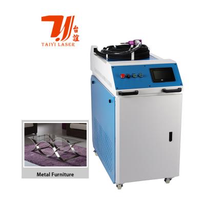Chine Soudeuse de laser de la fibre 1000w de refroidissement par l'eau, machine de soudure tenue dans la main de GV à vendre
