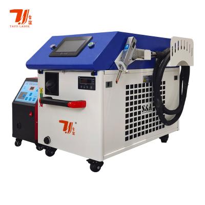 China Qilin Head Max Source Handheld Fiber Laser Welder For Stainless Steel Carbon Steel Aluminum Sheet for sale