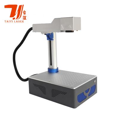 China Desktop 20W 30W 1064nm Optical Fiber Laser Marking Machine for sale