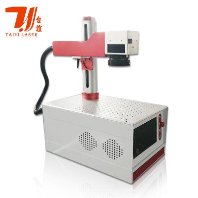 China 20W 30W 50W Mini Fiber Laser Marker portátil de escritorio en venta