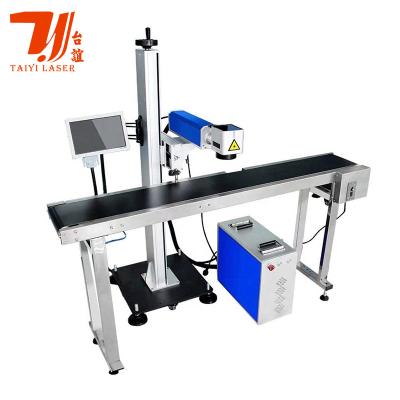 China 20W 30W 50W 100W Flying Fiber Laser Marking Machine For Automatic Production Line for sale