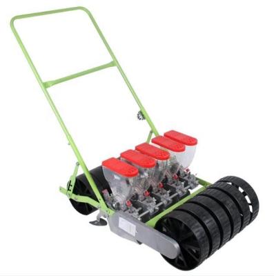 China Hand Propelled Vegetable Seeder Machine 4 Row Seed Depth Adjustable for sale