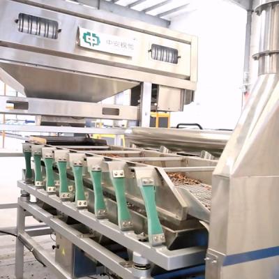China O CE certificou a noz-pecã de rachamento seca que descasca a capacidade 220V das porcas da máquina 100000 disponível à venda