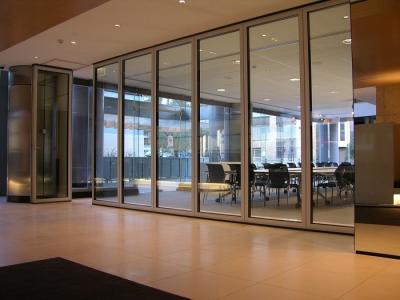 China Tempered and Stable Glass Sliding Partition Wall 65 mm Thickness for sale