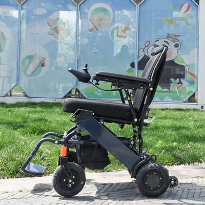 Китай Легкая электрическая складная инвалидная коляска с литий-ионным аккумулятором продается