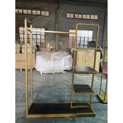 China Lady clothes store display stands racks high end stainless steel made for sale