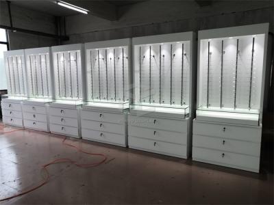 China Mobília ótica da sala de exposições do projeto do contador da loja do diodo emissor de luz T4 com Spotnight à venda