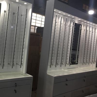 中国 小売りのガラス金属の接眼レンズは光学店のための飾り戸棚を 販売のため