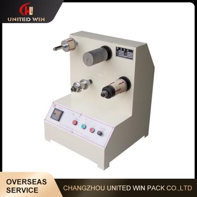 China Automatic Small Tape Rewinding Machine 150m/Min Core Loading Unloading Machine for sale