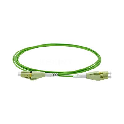 China KEXINT Uniboot Fiber Optical Patch Cord LC UPC Duplex OM5 LSZH Green for sale