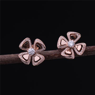 China Real Gold High Jewelry Fiorever Earrings in 18 kt Rose Gold Earrings set with two central diamonds and pavé diamonds for sale