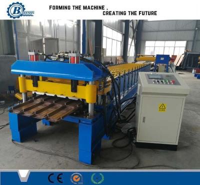 China Metal Trapezoidal Shape Step Roof Tile Roof Roll Forming Machine With Pressing Device for sale