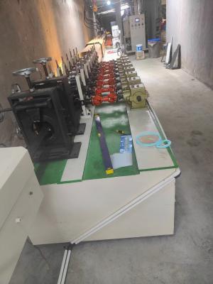 China Helical Gear Reducer Controlled Roller Shutter Door Machine with Photoelectric Sensor for sale