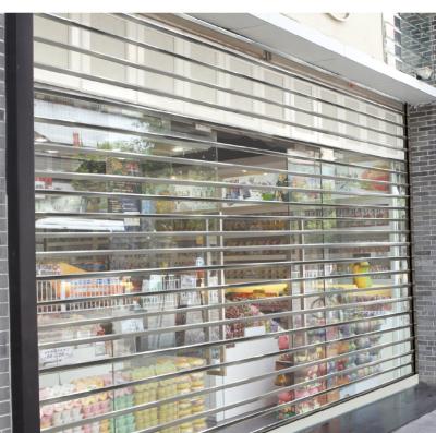 China Polycarbonate Slats Clear PVC Shutters Transparent Plastic Rolling Up Door for sale
