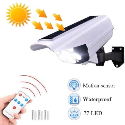 China 2 In 1 Solar Light Security Dummy Camera Motion Sensor Outdoor Solar Wall Lamp Rainproof for sale
