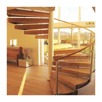 中国 Wholesale agent walnut hardwood stair tread interior steel glass spiral staircase 販売のため