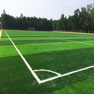 China Material falso de la hierba PE PP del campo de fútbol artificial sintético para el campo de fútbol en venta