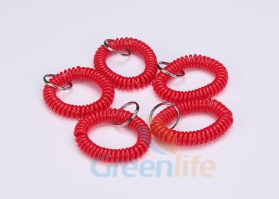 中国 Keychainの注文の多目的螺線形のブレスレット、赤いプラスチック手首のキーのホールダー 販売のため
