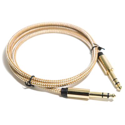 China Guita String RCA Cable de audio 6.35MM Cuerda tejida Interfaz de metal fino 0.8M en venta