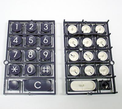 China Telephone Keyboard Double Injection Molding Process Parts Black And White for sale