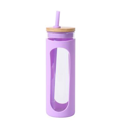 China Bamboo Sports Cap Glass Drinking Bottles 20oz With Protective Silicone Sleeve for sale