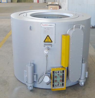 China 900KG Aluminum Holding Furnace Temperature Controlled Round Hydraulic for sale
