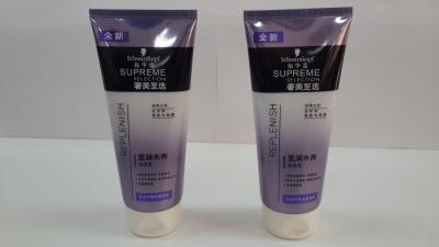 China Shiny Aluminum Laminated Cosmetic Packaging Tubes White Fixed Flip On Cap 200ml for sale