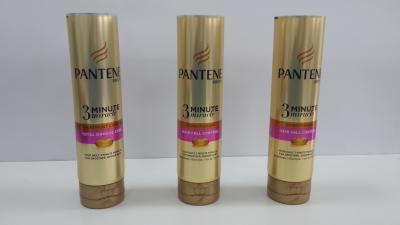 China Clear Plastic Packaging Tube Coating Aluminum Cosmetic Tubes Golden Shiny Material for sale