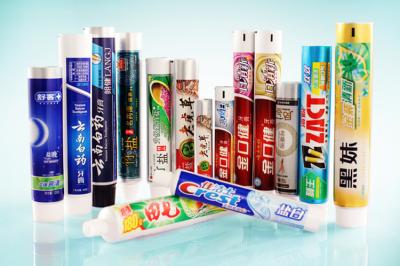 China El tubo de crema dental coloreado de la impresión en offset que empaquetaba, plástico laminó los tubos en venta