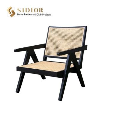 China Woven Vintage Rattan Armchair Indoor 58cm Width Solid Wood Chairs for sale