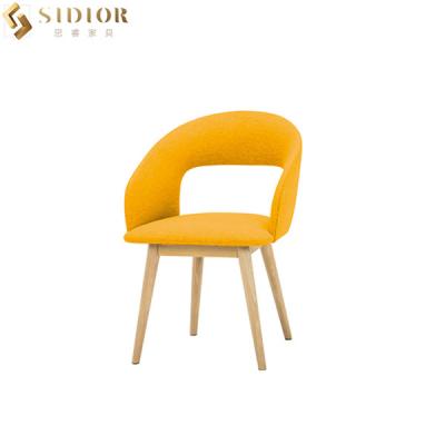 China Solid Wood Leg Wedding Dining Chair Yellow Fabric Dining Chairs SGS Approved for sale