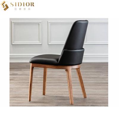 China 0.18 CBM Black Faux Leather Dining Chairs for sale