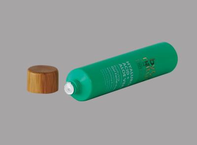 Chine tube 10-30ml en bambou empaquetant le tube facial en plastique de détergent de compression cosmétique vide faite sur commande à vendre