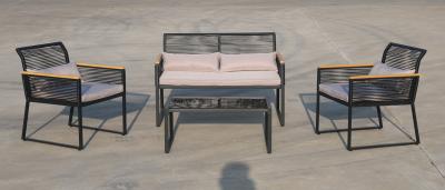 中国 庭の鉄骨フレームのPEの円形の藤のひものソファーのコーヒー テーブル4のセット 販売のため