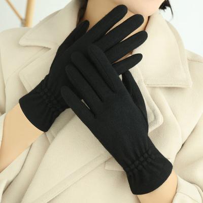 China Los guantes calientes del punto del invierno negro de las lanas para las mujeres dan calentado en venta