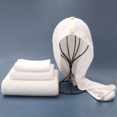 Chine La feuille 100% naturelle blanche de serviette de Bath de microfibre de coton a placé le nettoyage quotidien à vendre