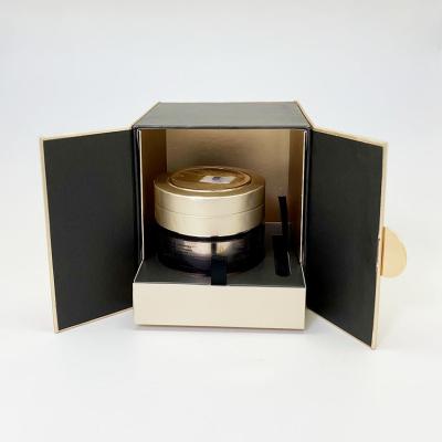 China Luxury Cosmetics Magnetic Packaging Paper Box With Two Doors Gold Metal Plate for sale