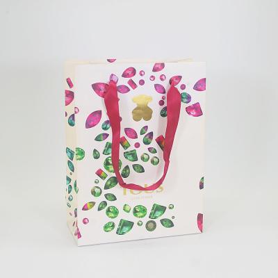 China Custom Logo Paper Gift Packaging Bag Printing With Peach Ribbon for sale