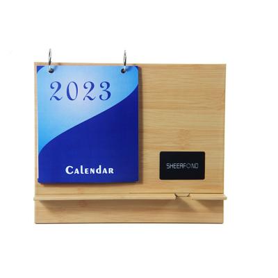 China Calendário de mesa de arte personalizado, planejador de calendário de mesa 2023 com carregador sem fio à venda