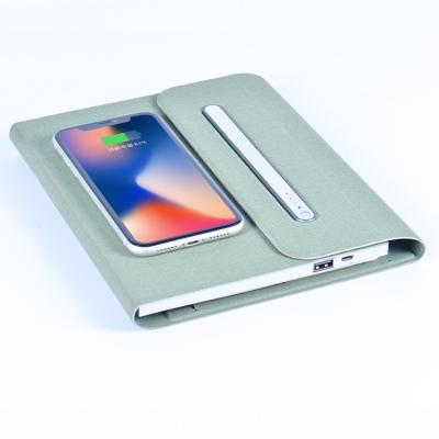 China Led Logo Smart Luxury Travelers Power Bank Wireless Charging Notebook A5 Pu Leather for sale