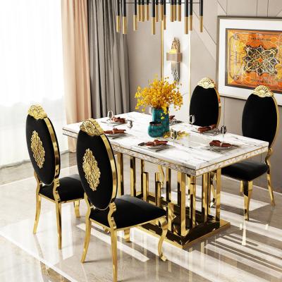 China Mobiliário de sala de jantar de estilo moderno Mesa de jantar de aço inoxidável de mármore Veludo / assento de PU à venda