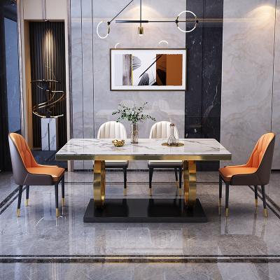 Cina Sette di sedie da tavola da pranzo in marmo in acciaio inossidabile con sedile in velluto / PU in vendita